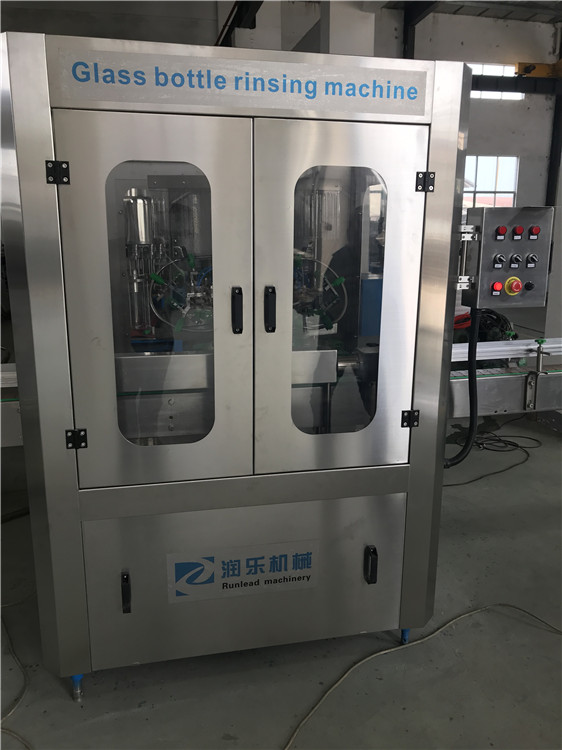 Glass bottle rinsing machine 